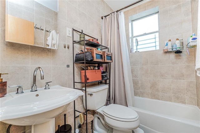 1519 71st St, Brooklyn, NY 11228 - bathroom featuring tile walls, toilet, a sink, and shower / bath combo with shower curtain
