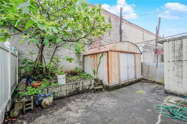 1519 71st St, Brooklyn, NY 11228 - view of shed featuring a fenced backyard
