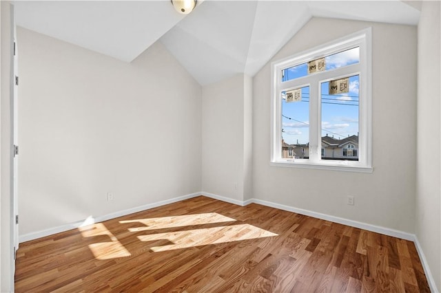 91 Robin Rd, Staten Island, NY 10305 - additional living space with wood finished floors, baseboards, and vaulted ceiling