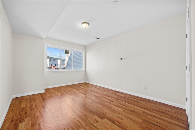 91 Robin Rd, Staten Island, NY 10305 - empty room with wood finished floors and baseboards