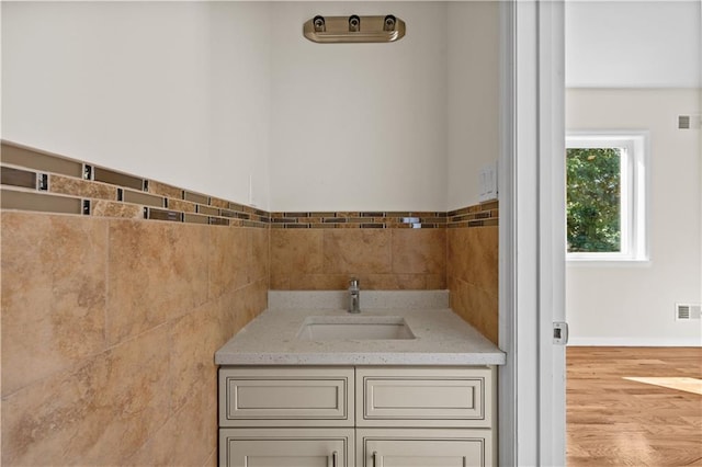 91 Robin Rd, Staten Island, NY 10305 - bathroom featuring a sink and wood finished floors