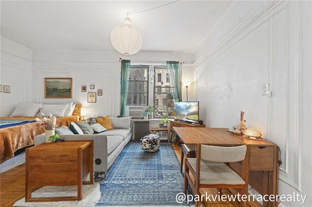 living area with radiator heating unit