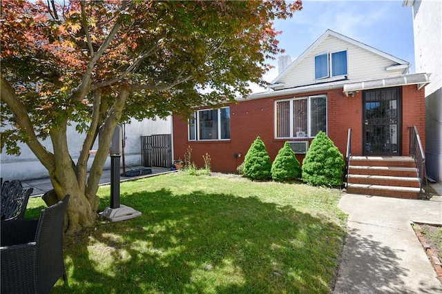 2064 Coleman St, Brooklyn, NY 11234 - view of front facade featuring a chimney, a front yard, and brick siding