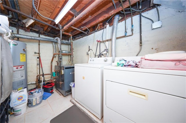 2039 Batchelder St, Brooklyn, NY 11229 - laundry room featuring gas water heater, washer and clothes dryer, and a heating unit