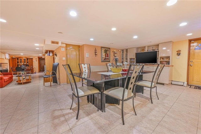 1401 74th St, Brooklyn, NY 11228 - dining room featuring light tile patterned floors and recessed lighting