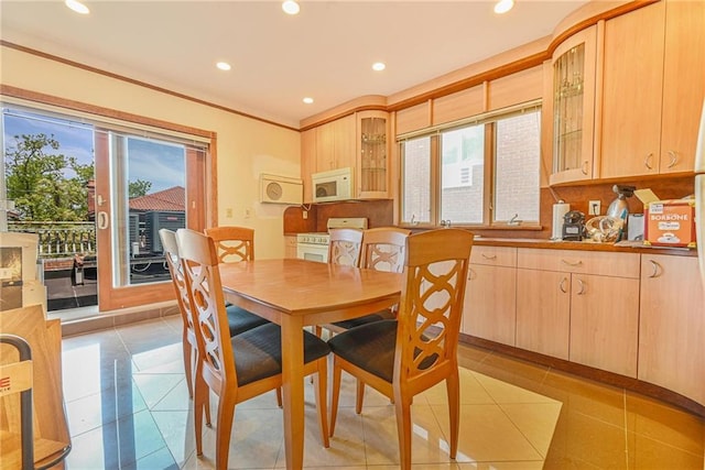 1401 74th St, Brooklyn, NY 11228 - dining area with healthy amount of natural light, recessed lighting, light tile patterned flooring, and ornamental molding