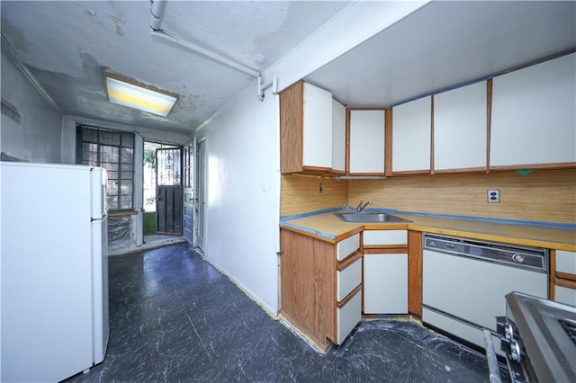 2327 E 16th St, Brooklyn, NY 11229 - kitchen with white appliances, a sink, light countertops, white cabinets, and tasteful backsplash