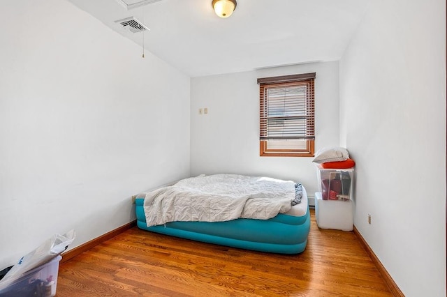 1440 81st St, Brooklyn, NY 11228 - bedroom with baseboards and wood finished floors