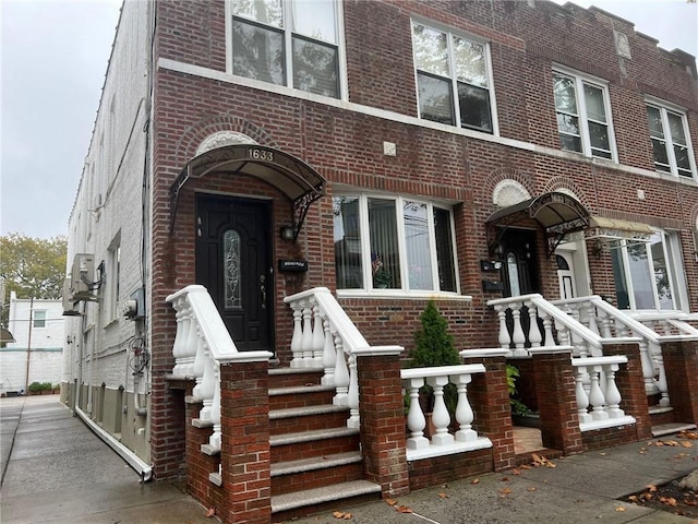multi unit property featuring brick siding