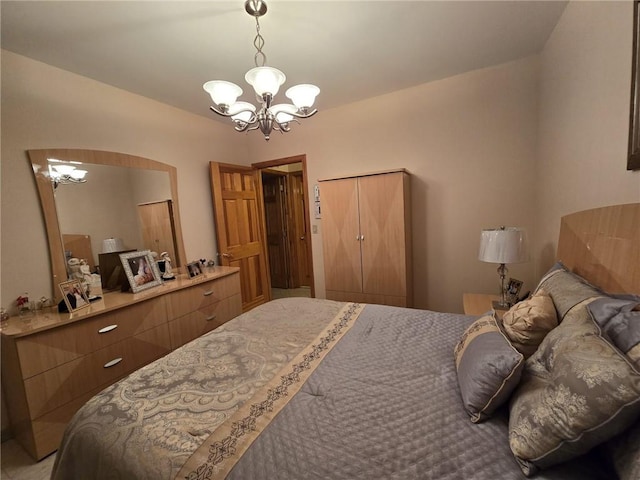 bedroom featuring a chandelier