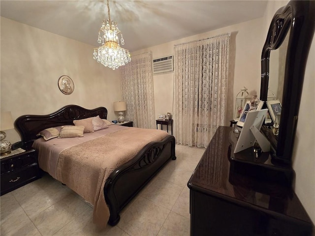 bedroom with a wall mounted air conditioner, a chandelier, and light tile patterned floors