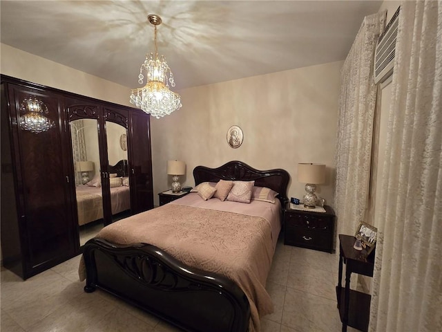 bedroom with light tile patterned floors, a chandelier, and french doors