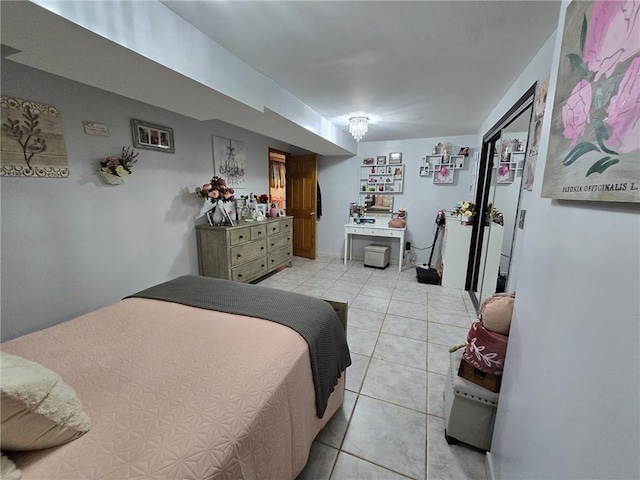 bedroom featuring light tile patterned flooring