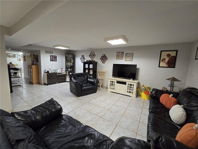living area featuring light tile patterned floors
