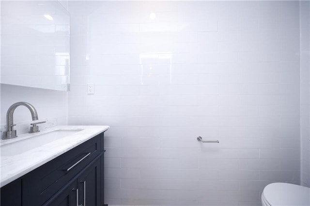 1238 77th St, Brooklyn, NY 11228 - half bathroom featuring vanity and toilet