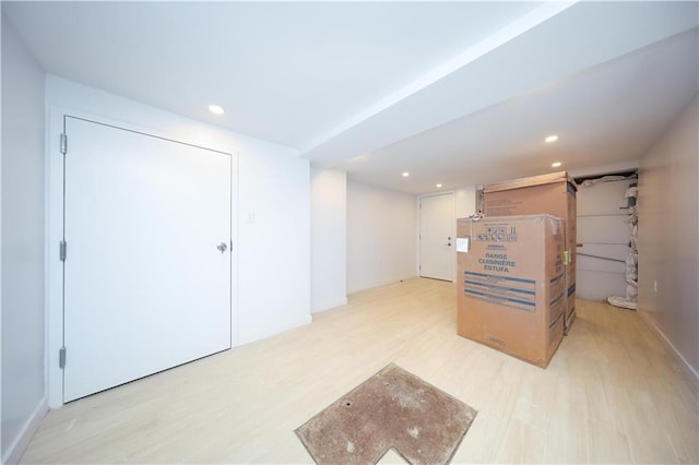 1238 77th St, Brooklyn, NY 11228 - basement featuring light wood-style flooring and recessed lighting