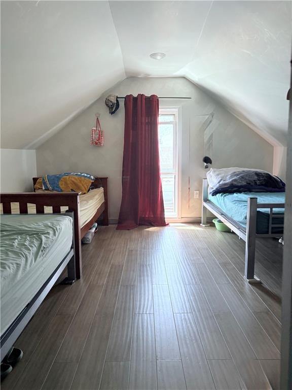2349 W 12th St, Brooklyn, NY 11223 - bedroom featuring wood finished floors and vaulted ceiling