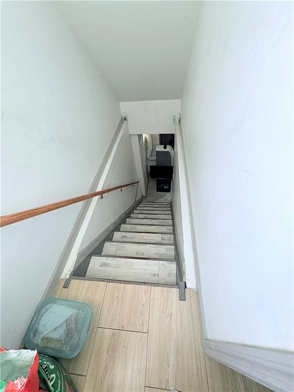 2349 W 12th St, Brooklyn, NY 11223 - staircase featuring wood finished floors