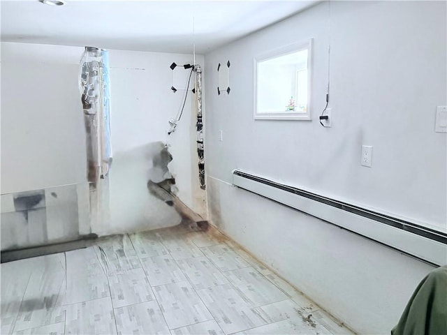 2349 W 12th St, Brooklyn, NY 11223 - interior space with a baseboard heating unit