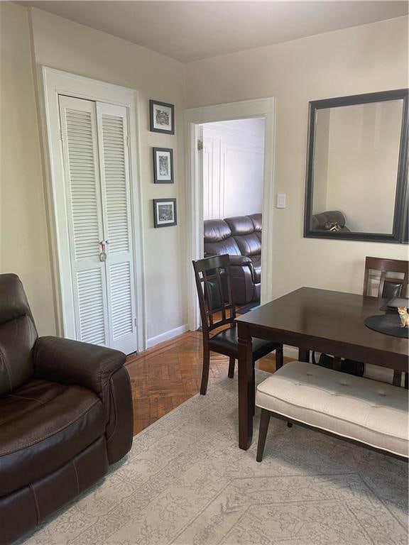 dining room featuring baseboards