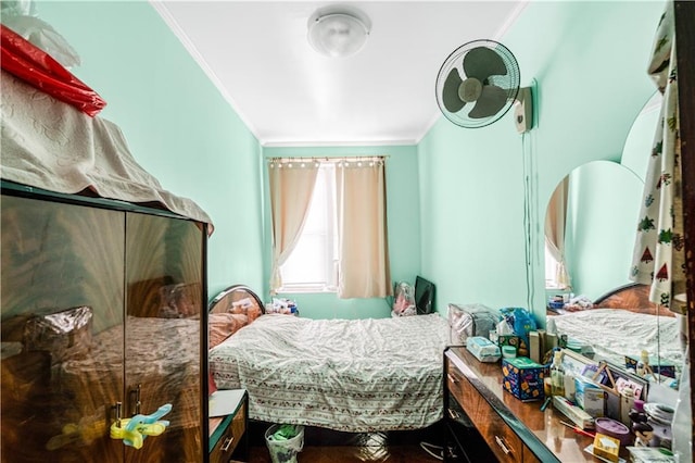 bedroom with crown molding