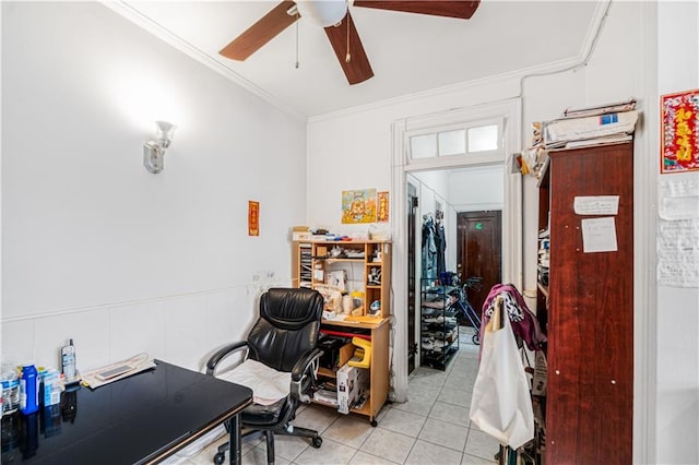 tiled home office with ceiling fan and crown molding