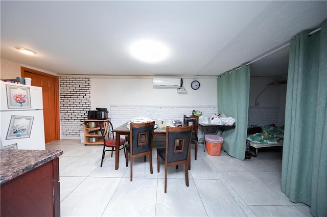 dining space with a wall mounted air conditioner and light tile patterned flooring