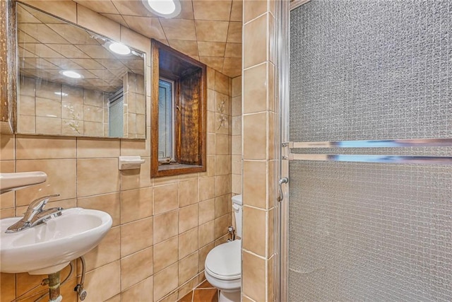 1155 Shore Pkwy, Brooklyn, NY 11214 - bathroom featuring tile walls and a shower stall