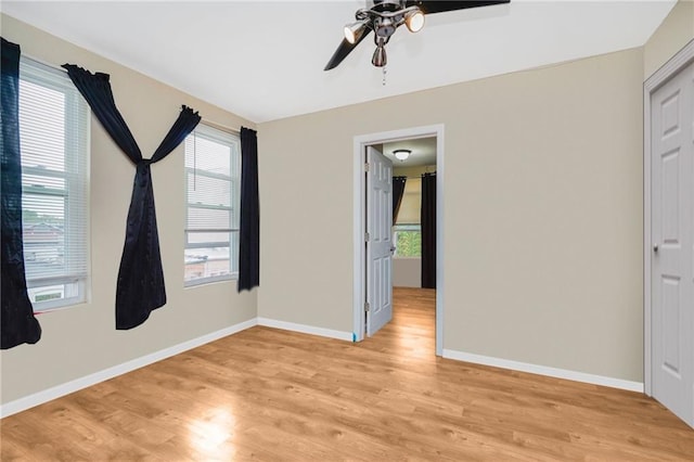 1113 68th St, Brooklyn, NY 11219 - unfurnished room featuring healthy amount of natural light, a ceiling fan, and light wood-type flooring