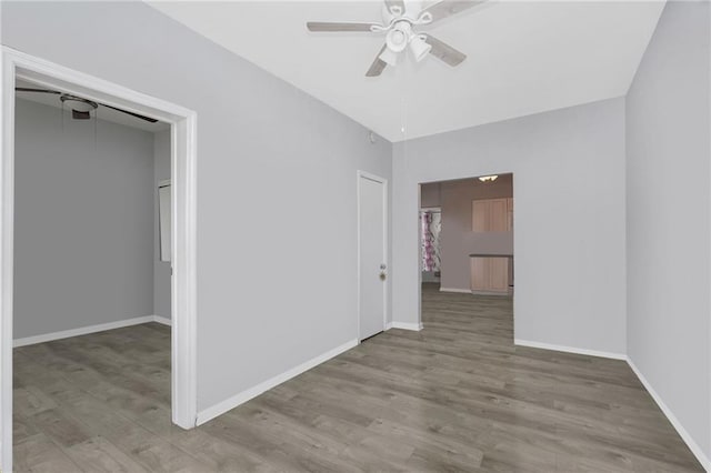 1113 68th St, Brooklyn, NY 11219 - unfurnished bedroom featuring wood finished floors, baseboards, and ceiling fan
