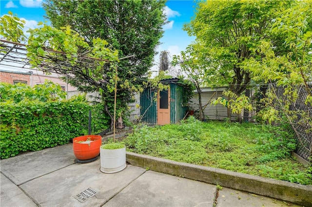 1113 68th St, Brooklyn, NY 11219 - fenced backyard featuring a patio