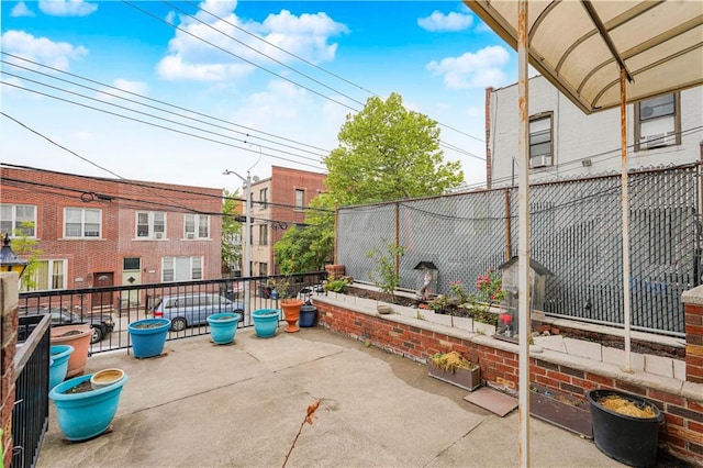 1113 68th St, Brooklyn, NY 11219 - view of patio featuring a balcony