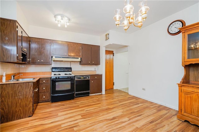 1113 68th St, Brooklyn, NY 11219 - kitchen with dishwasher, gas range oven, under cabinet range hood, light wood-type flooring, and tasteful backsplash