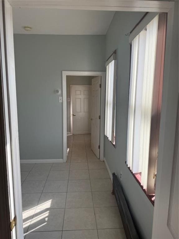 1113 68th St, Brooklyn, NY 11219 - hall with light tile patterned flooring and baseboards