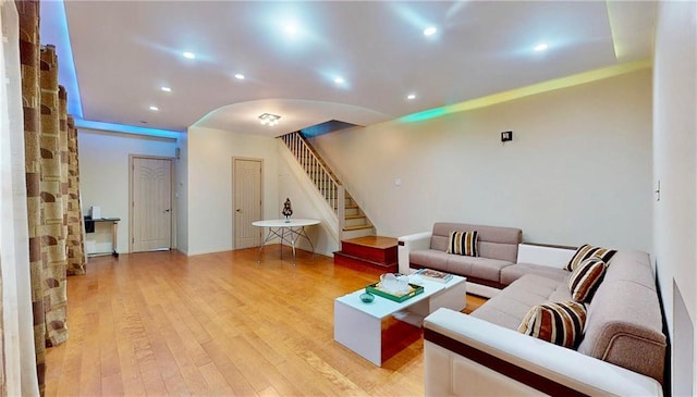 2291 E 21st St, Brooklyn, NY 11229 - living room with stairway, light wood-style floors, recessed lighting, arched walkways, and baseboards
