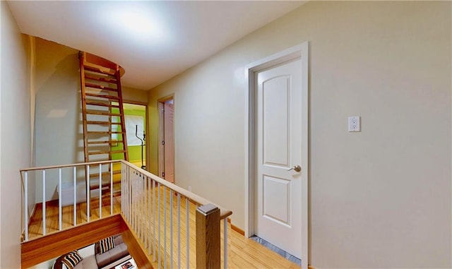 2291 E 21st St, Brooklyn, NY 11229 - hall featuring an upstairs landing, light wood-type flooring, and baseboards