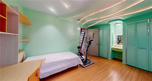 2291 E 21st St, Brooklyn, NY 11229 - bedroom featuring wood finished floors and multiple closets