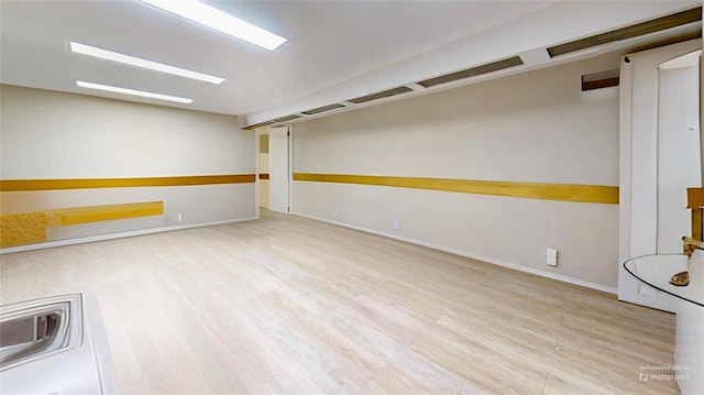 2291 E 21st St, Brooklyn, NY 11229 - empty room with wood finished floors and baseboards