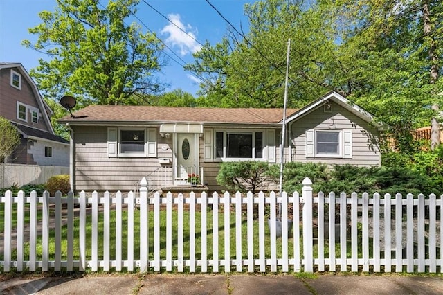 view of front of property with a fenced front yard