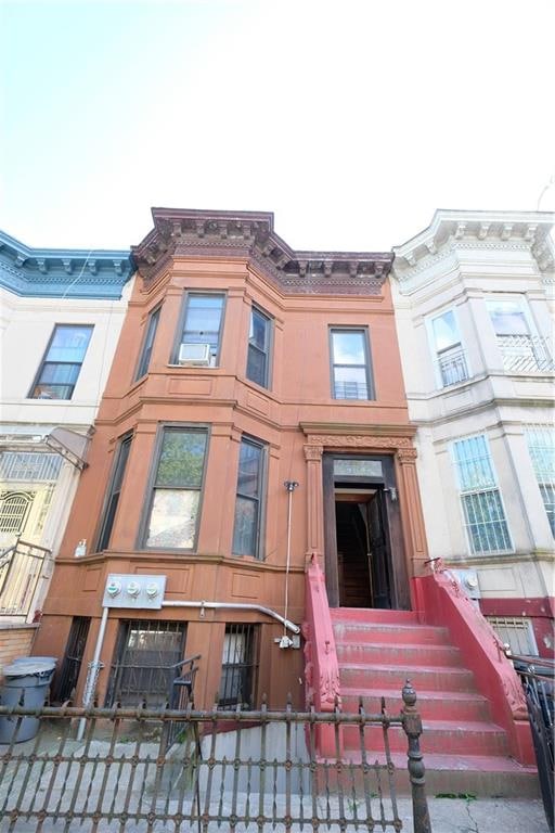 642 56th St, Brooklyn, NY 11220 - view of building exterior featuring a fenced front yard