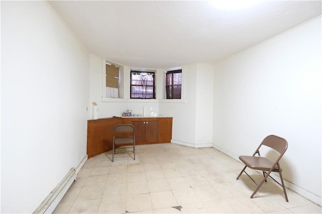 642 56th St, Brooklyn, NY 11220 - unfurnished room with light floors, baseboards, and a baseboard radiator