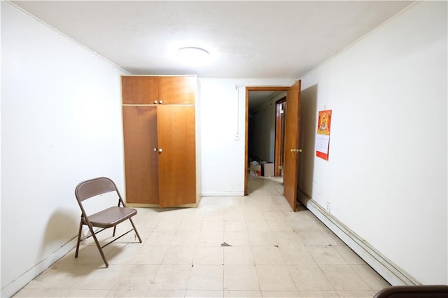 642 56th St, Brooklyn, NY 11220 - unfurnished bedroom featuring a baseboard heating unit, baseboards, light flooring, and crown molding