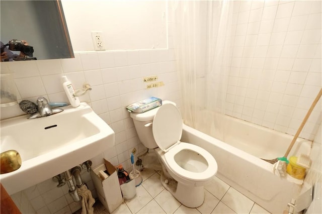642 56th St, Brooklyn, NY 11220 - full bath featuring toilet, a sink, tile patterned flooring, and washtub / shower combination