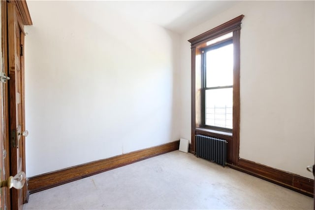 642 56th St, Brooklyn, NY 11220 - unfurnished room with radiator heating unit and healthy amount of natural light