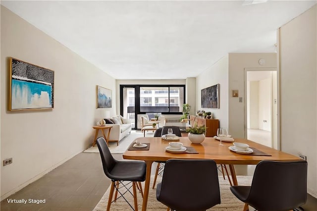 333 Pearl St Unit 8E, New York, NY 10038 - dining area with baseboards