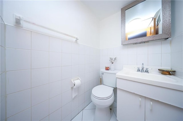 97 Debbie St Unit 97, Staten Island, NY 10314 - bathroom with tile walls, toilet, vanity, and tile patterned floors