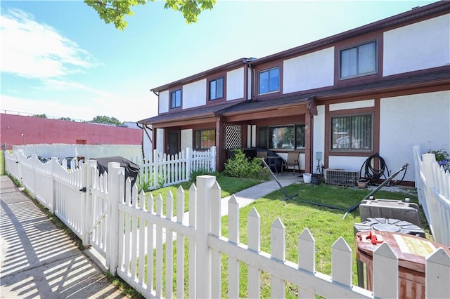 97 Debbie St Unit 97, Staten Island, NY 10314 - view of front of property with stucco siding and a gate