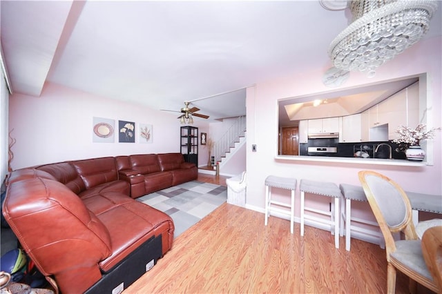 97 Debbie St Unit 97, Staten Island, NY 10314 - living area with stairs, a ceiling fan, and light wood-style floors