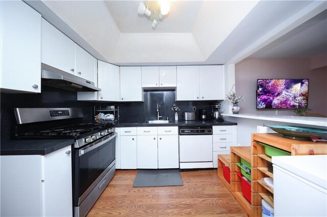 97 Debbie St Unit 97, Staten Island, NY 10314 - kitchen with appliances with stainless steel finishes, under cabinet range hood, white cabinetry, and backsplash