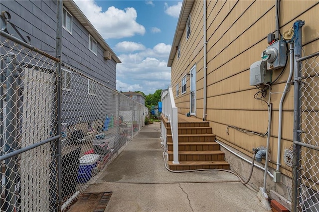 view of home's exterior with fence